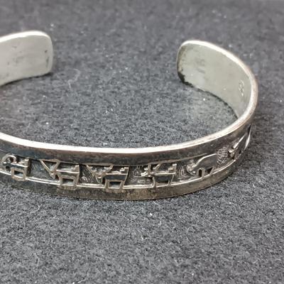 2 STERLING SILVER CUFF BRACELETS (1 IS SIGNED ARTIE YELLOWHORSE) 81.32g