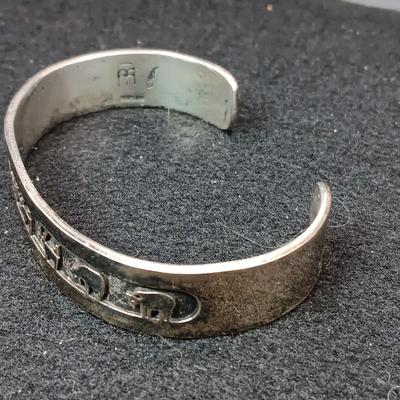 2 STERLING SILVER CUFF BRACELETS (1 IS SIGNED ARTIE YELLOWHORSE) 81.32g