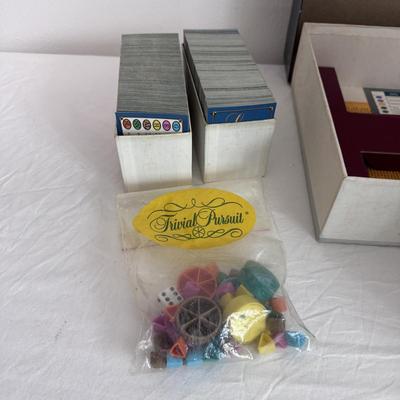 Collection of Games and Crafting Supplies Including Trivial Pursuit, Travel Scrabble, and Crayons (B1-DZ)