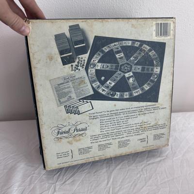 Collection of Games and Crafting Supplies Including Trivial Pursuit, Travel Scrabble, and Crayons (B1-DZ)