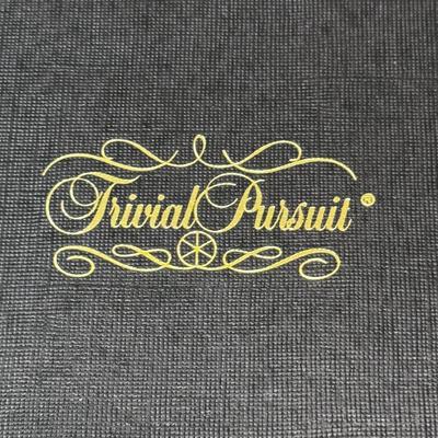 Collection of Games and Crafting Supplies Including Trivial Pursuit, Travel Scrabble, and Crayons (B1-DZ)