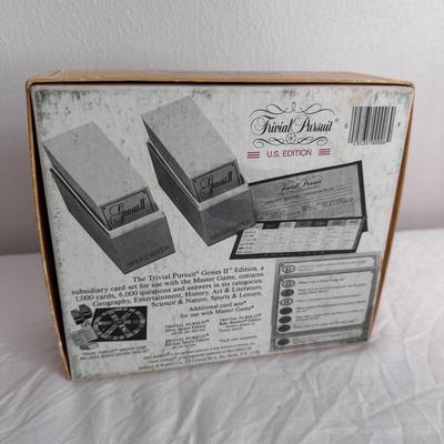 Collection of Games and Crafting Supplies Including Trivial Pursuit, Travel Scrabble, and Crayons (B1-DZ)