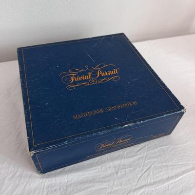 Collection of Games and Crafting Supplies Including Trivial Pursuit, Travel Scrabble, and Crayons (B1-DZ)