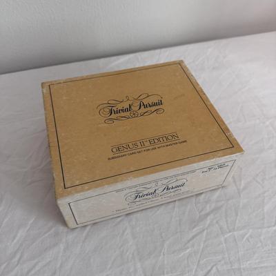 Collection of Games and Crafting Supplies Including Trivial Pursuit, Travel Scrabble, and Crayons (B1-DZ)