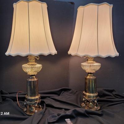 Sale Photo Thumbnail #37: Brass Lamps with crystal accents, 33 inches tall.
There is a small crack in one of the crystal globes on one lamp.  
Retails at $400 per pair
Good condition