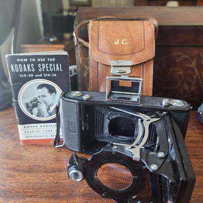 Sale Photo Thumbnail #75: Vintage Folding Camera, AS IS
Made in Germany  
No lens  Bellows needs to be re-attached
Leather Case
Missing Parts, could be used for repair parts