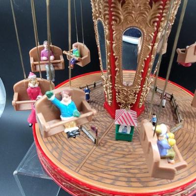 Sale Photo Thumbnail #82: Vintage Musical Swing Carousel,  Victorian dress on people, musical,  
Battery operated.  
Excellent condition
No box