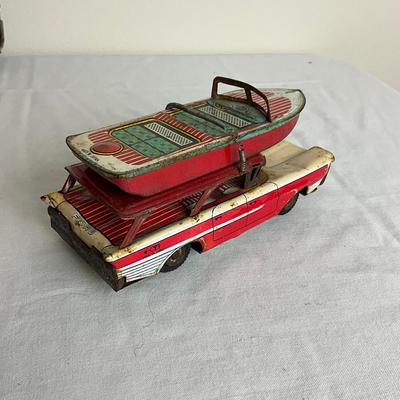 D940 Vintage Marx Steel Rowboat Toy With Tin Metal Ford Car with Boat Toy