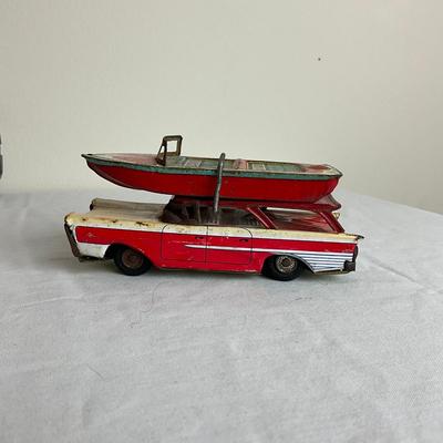 D940 Vintage Marx Steel Rowboat Toy With Tin Metal Ford Car with Boat Toy