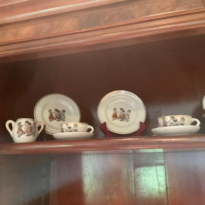 L1216 Four Shelves of Vintage Children's China Dishes