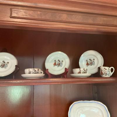 L1216 Four Shelves of Vintage Children's China Dishes