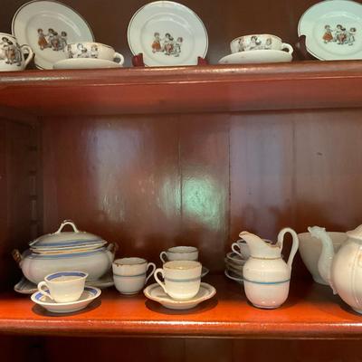 L1216 Four Shelves of Vintage Children's China Dishes