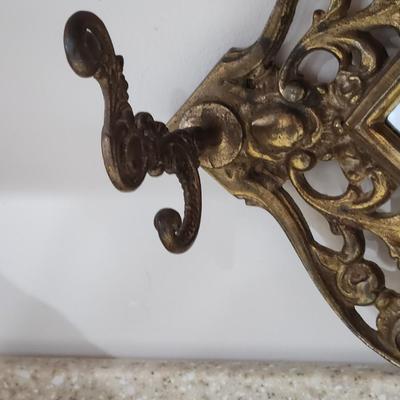 Mirror with coat hooks