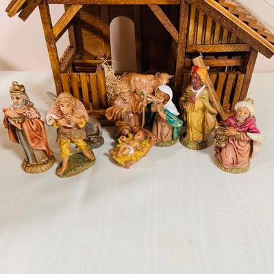 LOT 35: Assortment of Christmas Decorations Including a Nativity Set, Lenox Angel, Ornaments and More
