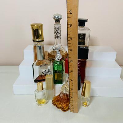LOT 42: Collection of Glass Perfume Bottles -Arpege Eau De Lanvin, Jacques Fath, Balmain and More