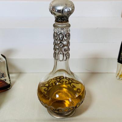 LOT 42: Collection of Glass Perfume Bottles -Arpege Eau De Lanvin, Jacques Fath, Balmain and More