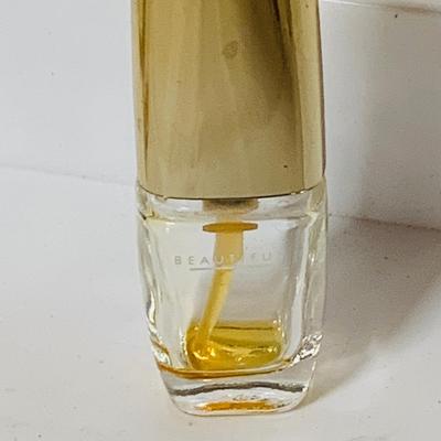 LOT 42: Collection of Glass Perfume Bottles -Arpege Eau De Lanvin, Jacques Fath, Balmain and More