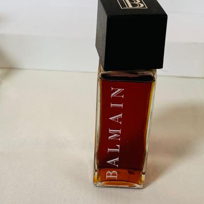 LOT 42: Collection of Glass Perfume Bottles -Arpege Eau De Lanvin, Jacques Fath, Balmain and More