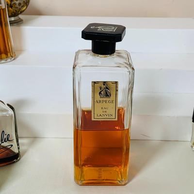 LOT 42: Collection of Glass Perfume Bottles -Arpege Eau De Lanvin, Jacques Fath, Balmain and More