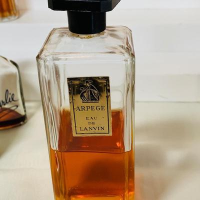 LOT 42: Collection of Glass Perfume Bottles -Arpege Eau De Lanvin, Jacques Fath, Balmain and More
