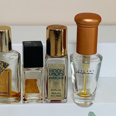 LOT 43; Large Assortment of Mini. Perfume Bottles by Isadora, Shalimar, Guerlain, and More