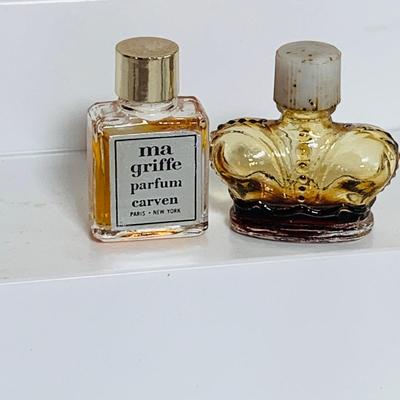 LOT 43; Large Assortment of Mini. Perfume Bottles by Isadora, Shalimar, Guerlain, and More