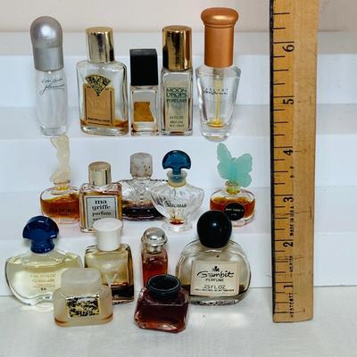 LOT 43; Large Assortment of Mini. Perfume Bottles by Isadora, Shalimar, Guerlain, and More