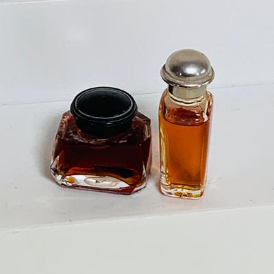 LOT 43; Large Assortment of Mini. Perfume Bottles by Isadora, Shalimar, Guerlain, and More