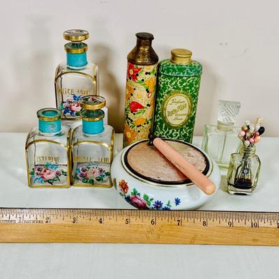 LOT 44: Vintage Vanity Necessity Including Hand Painted Glass Bottles, Metal Power Bottles, a Ceramic Jaw with Mirror Lid and More