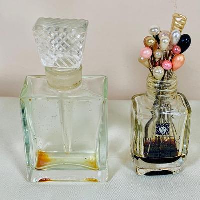 LOT 44: Vintage Vanity Necessity Including Hand Painted Glass Bottles, Metal Power Bottles, a Ceramic Jaw with Mirror Lid and More
