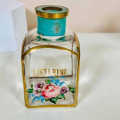 LOT 44: Vintage Vanity Necessity Including Hand Painted Glass Bottles, Metal Power Bottles, a Ceramic Jaw with Mirror Lid and More