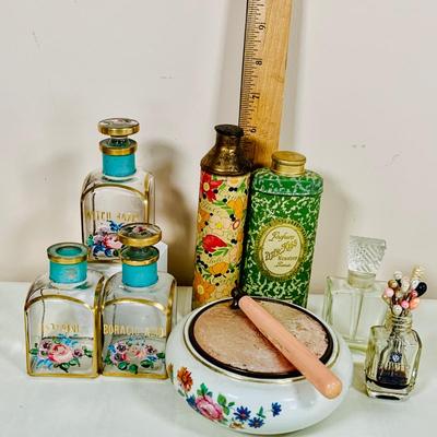 LOT 44: Vintage Vanity Necessity Including Hand Painted Glass Bottles, Metal Power Bottles, a Ceramic Jaw with Mirror Lid and More