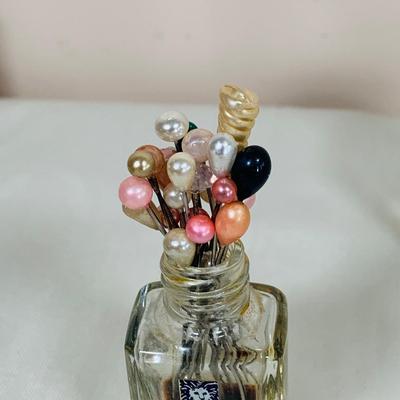 LOT 44: Vintage Vanity Necessity Including Hand Painted Glass Bottles, Metal Power Bottles, a Ceramic Jaw with Mirror Lid and More