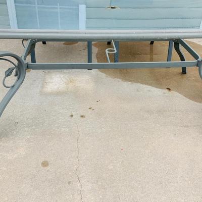 LOT 46: Outdoor Glass Top Table and Four Chairs
