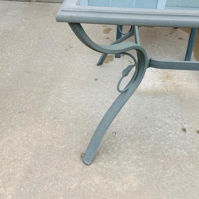 LOT 46: Outdoor Glass Top Table and Four Chairs