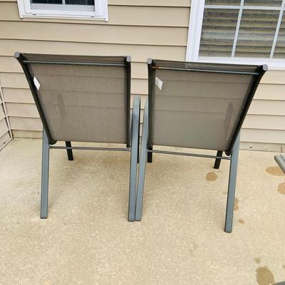 LOT 46: Outdoor Glass Top Table and Four Chairs