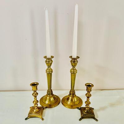 LOT 52: Basketful of Candles, Frames and Display Easels and Brass Candle Sticks and More