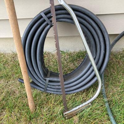 LOT 60: Lawn and Garden - Hose and Hose Mobile Holder, Rakes, Step 2 Rolling Garden Cart / Seat with Contents and More