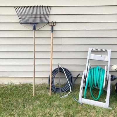 LOT 60: Lawn and Garden - Hose and Hose Mobile Holder, Rakes, Step 2 Rolling Garden Cart / Seat with Contents and More