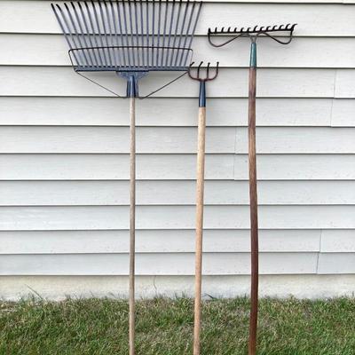 LOT 60: Lawn and Garden - Hose and Hose Mobile Holder, Rakes, Step 2 Rolling Garden Cart / Seat with Contents and More