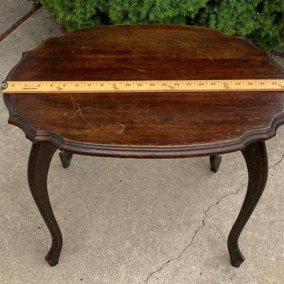 LOT 64: Wooden Rocking Chair with Side Table