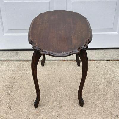 LOT 64: Wooden Rocking Chair with Side Table