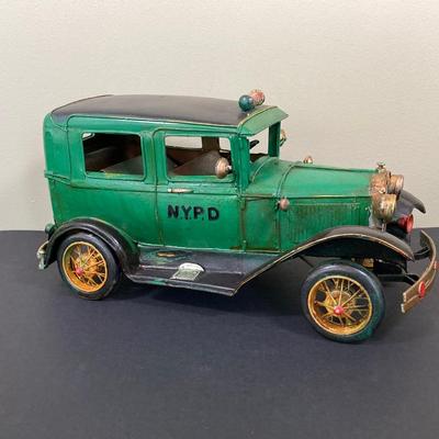 LOT 67: Vintage NYPD Toy Car / Truck with New York City Postcard