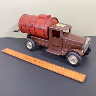 LOT 68: Shell Oil Metal Truck with Miniature Oil Drums and D.P.W. Oil Delivery Truck (Metalcraft Gearbox)