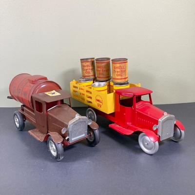 LOT 68: Shell Oil Metal Truck with Miniature Oil Drums and D.P.W. Oil Delivery Truck (Metalcraft Gearbox)