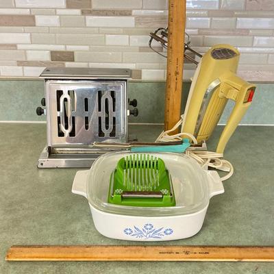 LOT 74: Vintage Kitchen Appliances and More - General Electric Mixer, Easy Twist by Foley Jar Opener, Toaster, Corning Ware Blue Corn...