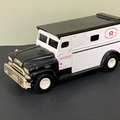 LOT 77: Deepwater Industries Federal Credit Union Diecast Armored Truck Bank, Oversized One Cent Bank and Hand Crafted Metal Brinks Truck