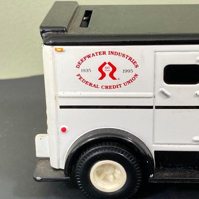 LOT 77: Deepwater Industries Federal Credit Union Diecast Armored Truck Bank, Oversized One Cent Bank and Hand Crafted Metal Brinks Truck