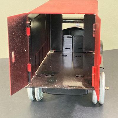 LOT 77: Deepwater Industries Federal Credit Union Diecast Armored Truck Bank, Oversized One Cent Bank and Hand Crafted Metal Brinks Truck