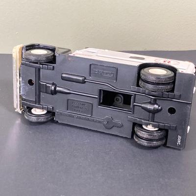 LOT 77: Deepwater Industries Federal Credit Union Diecast Armored Truck Bank, Oversized One Cent Bank and Hand Crafted Metal Brinks Truck